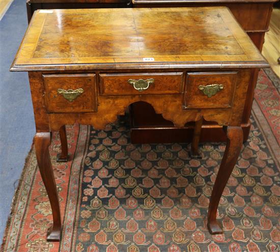 An early 18th century walnut lowboy W.76cm